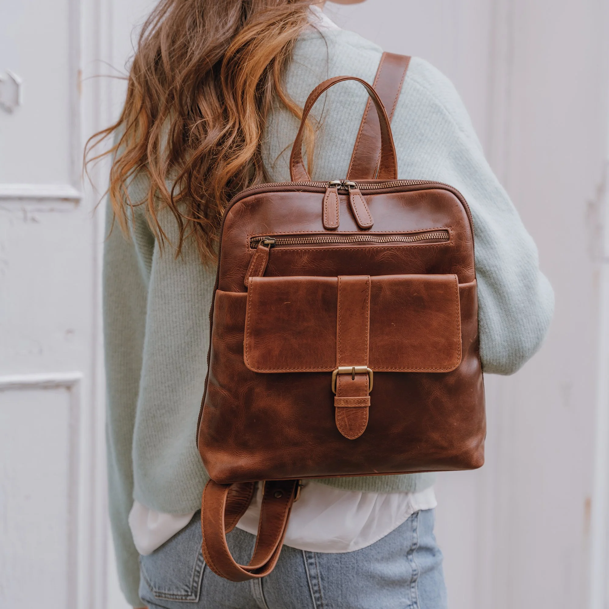 Worn leather backpack hotsell